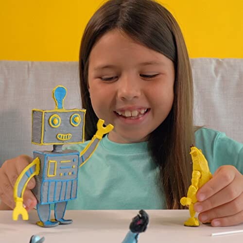 Child playing with robot and banana toy figures