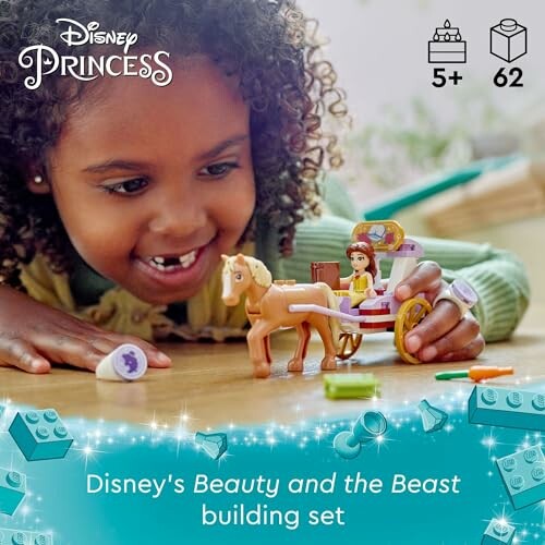 Child playing with Disney Princess Beauty and the Beast building set.