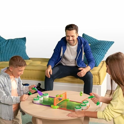 Family playing a board game on a round table with couch in background.