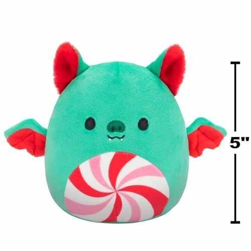 Green plush bat toy with red ears and wings