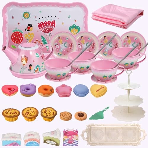 Colorful children's tea set with cups, plates, teapot, and toy desserts.