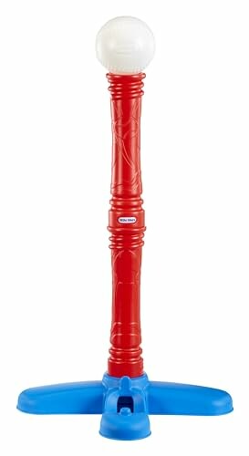 Red T-ball stand with blue base and white ball on top