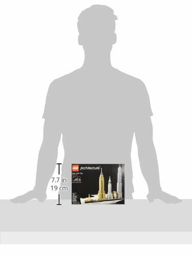 Silhouette of person with LEGO Architecture Dubai set.