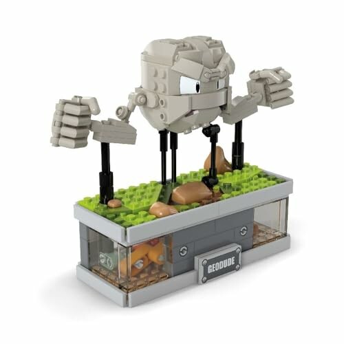 Lego model of Geodude on a display stand, perfect for showcasing your love for the Pokémon franchise.