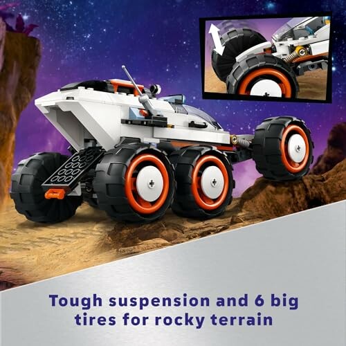 Lego Mars rover with six large tires on rocky terrain.