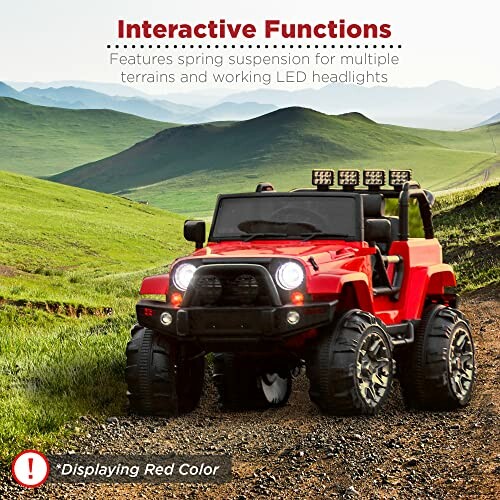 Red ride-on jeep toy car with LED headlights on grassy terrain.