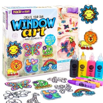 Window art kit with colorful designs and painting supplies.